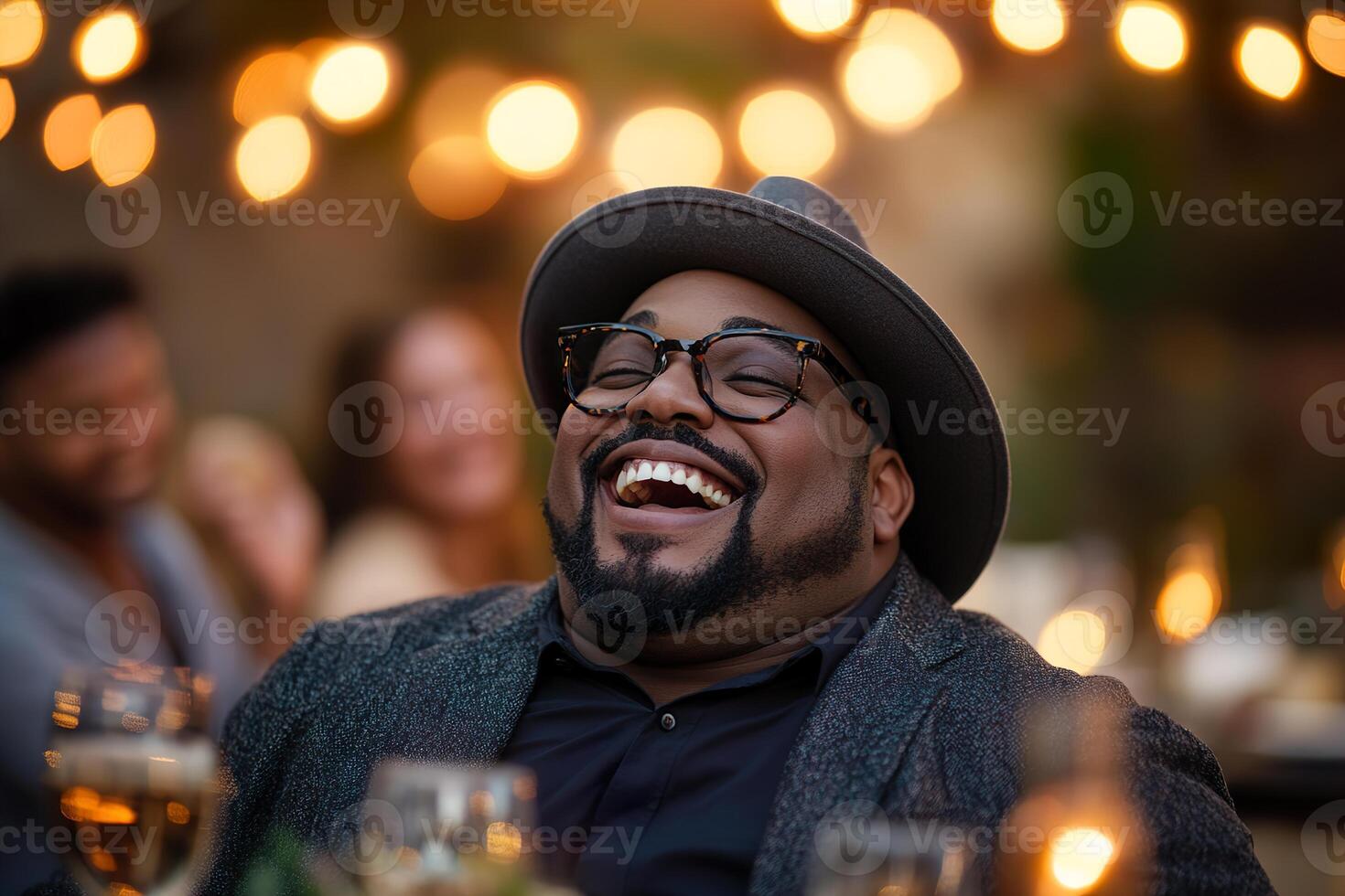 Surrounded by friends, a joyful overweight man shares laughter during an elegant rooftop dinner party. The warm atmosphere, enhanced by string lights, creates a luxurious setting for connection photo
