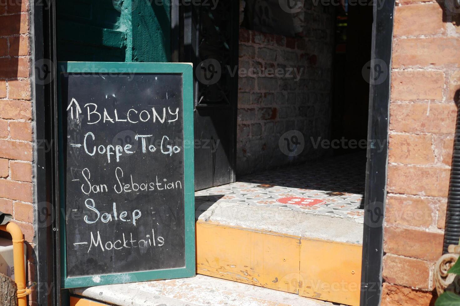 Coffee to go and cocktails offered at San Sebastian balcony cafe photo