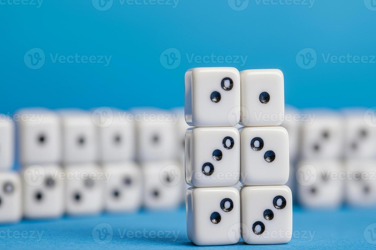 Planning risk and strategic growth concept. Stacked dice on a blue background creating a playful and vibrant composition. photo