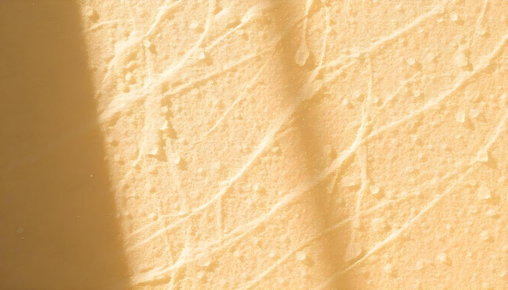 Smooth, creamy yellow background with subtle textured patterns photo