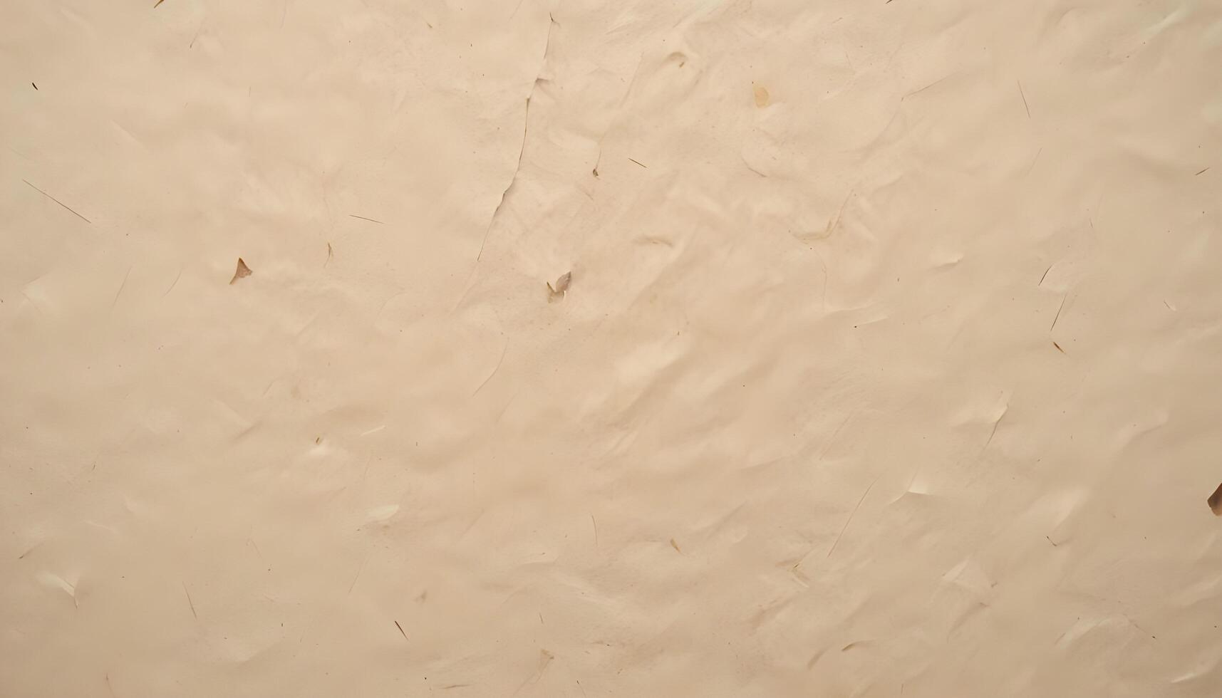 Coarse handmade paper texture with irregular grain patterns and soft natural fiber details photo