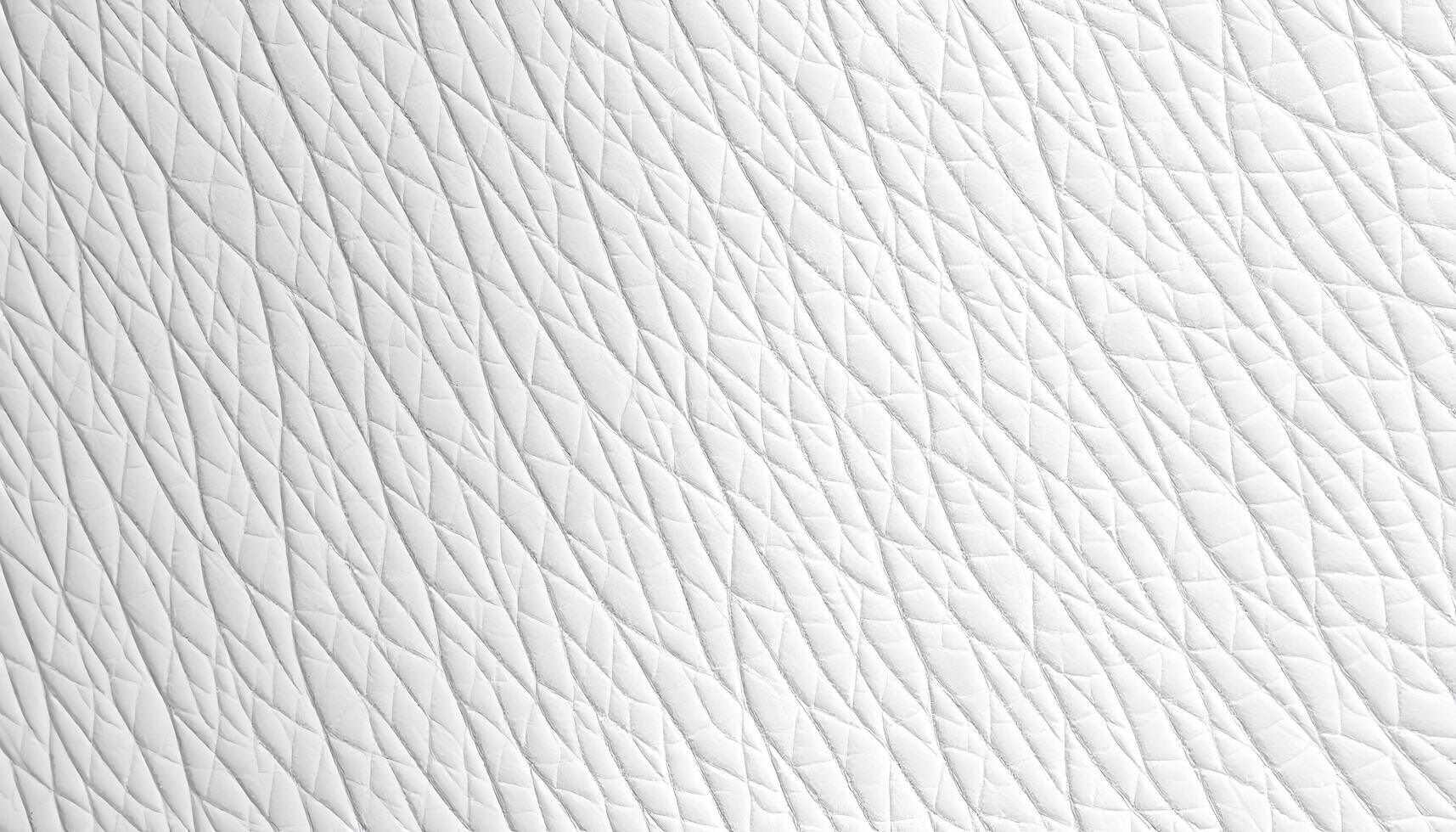 White leather texture with diagonal stitching patterns photo