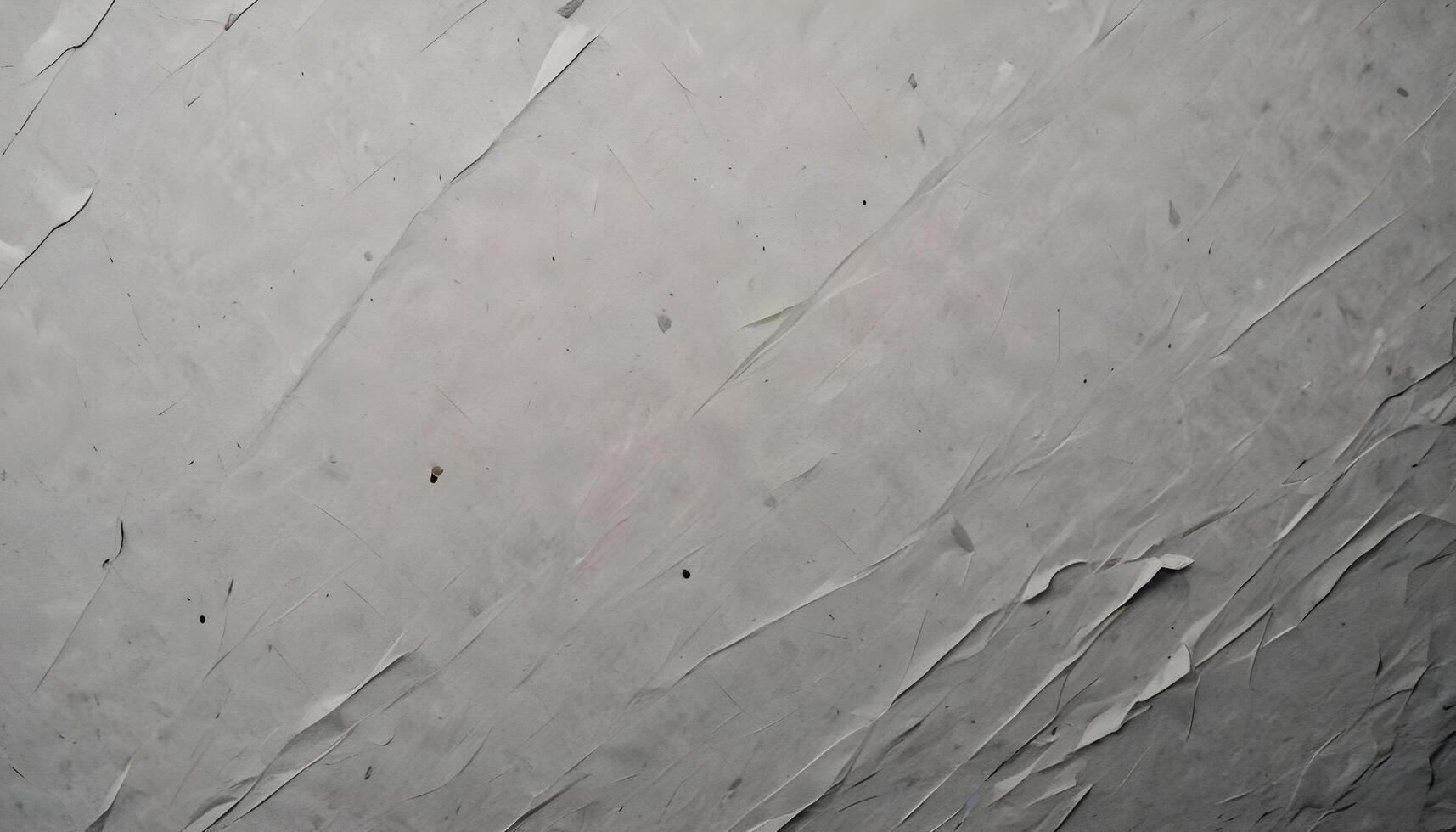 Softly weathered rough paper texture with a dry coarse feel and visible handmade imperfections photo