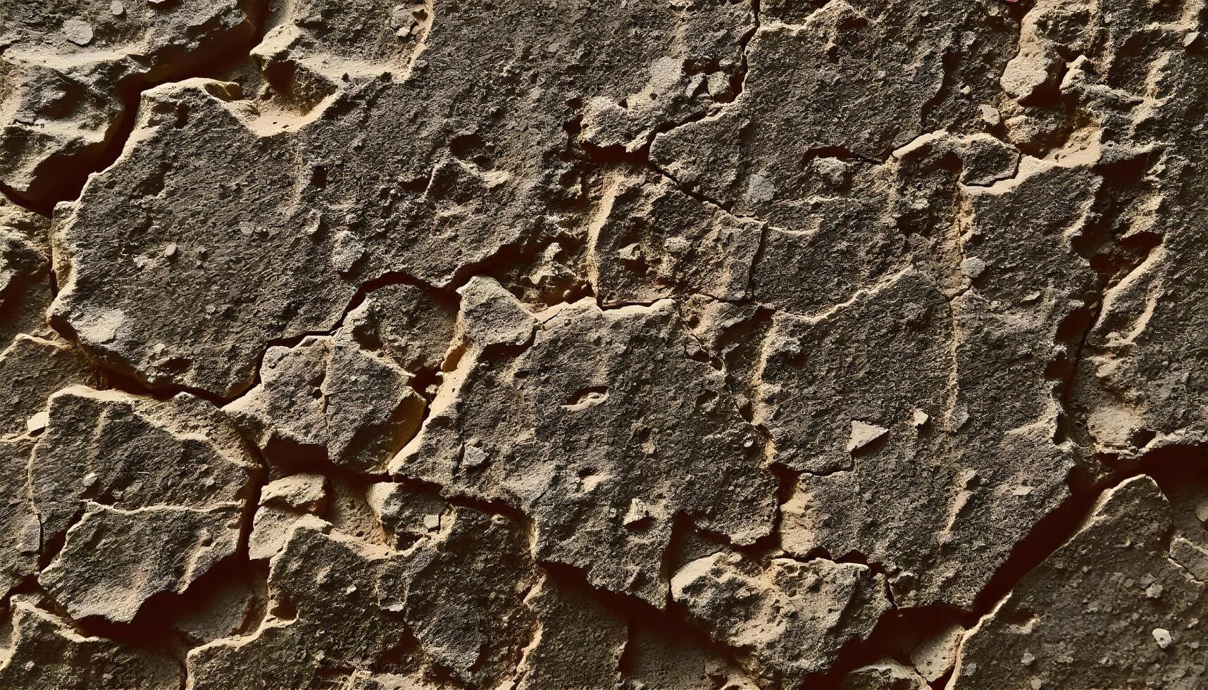 Honed stone texture with a soft sheen and rugged edges photo