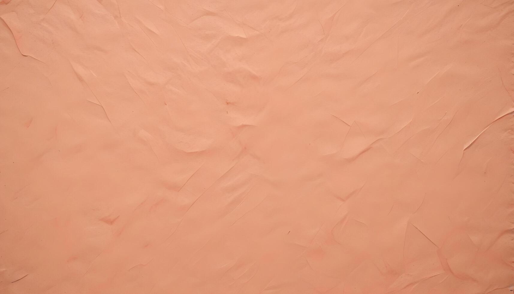 Handmade style paper texture with a rugged uneven surface and raw fibrous grain pattern photo