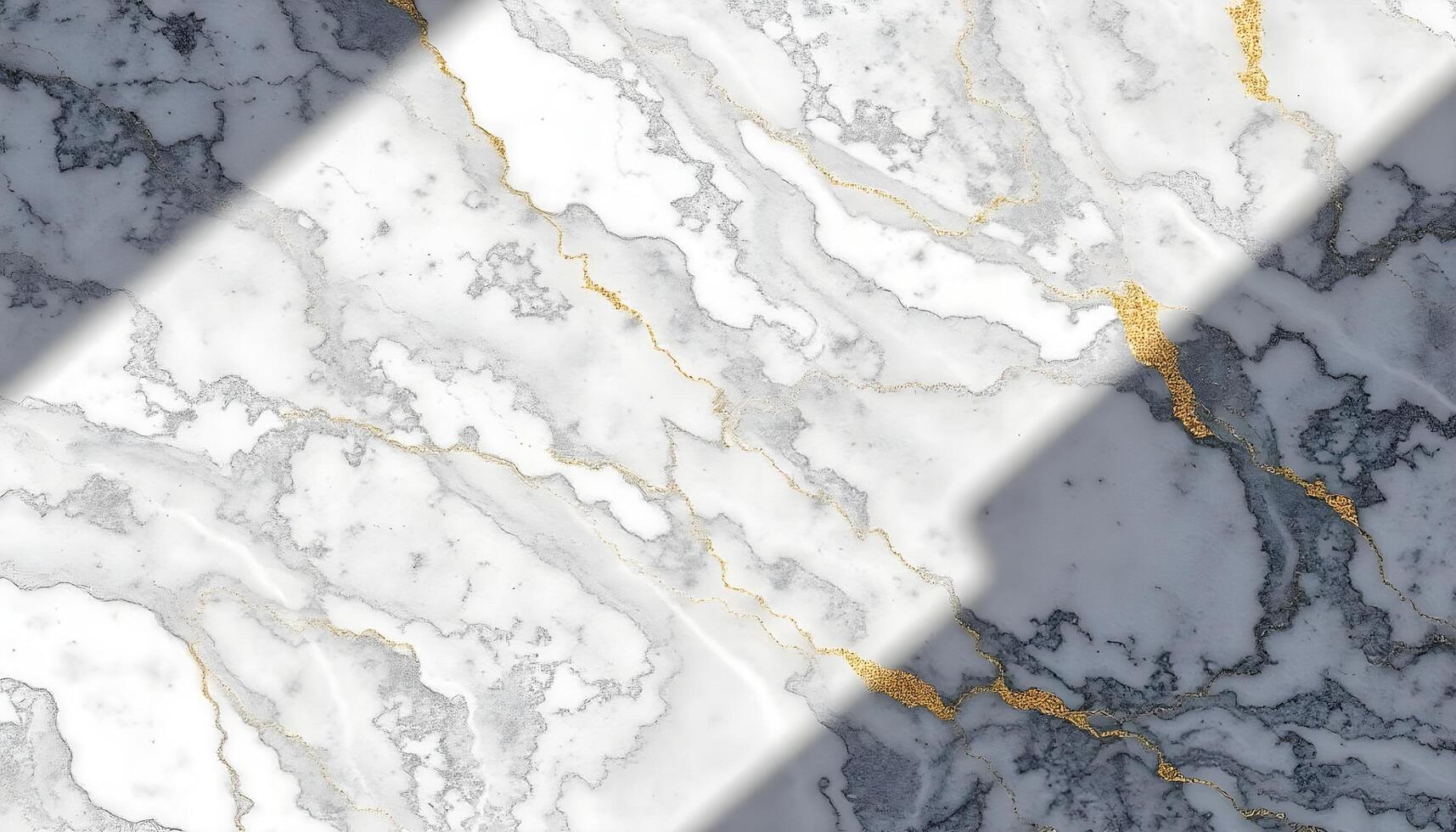 Gray and white marble texture with gold flecks, illuminated by soft natural light photo