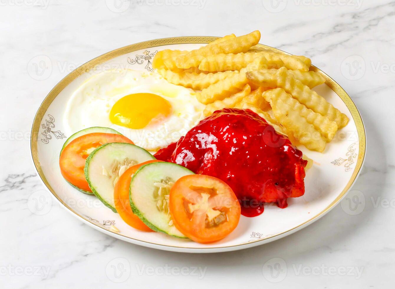 Chicken chop, sunny side up egg Egg, loaded fries, fresh cucumber and tomato slices served in plate isolated on marble background side view of singapore breakfast food photo