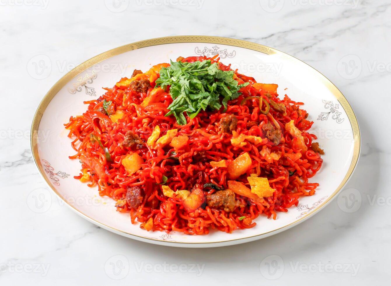 Spicy Sichuan Dan Dan Noodles served in plate isolated on marble background side view of singapore food photo
