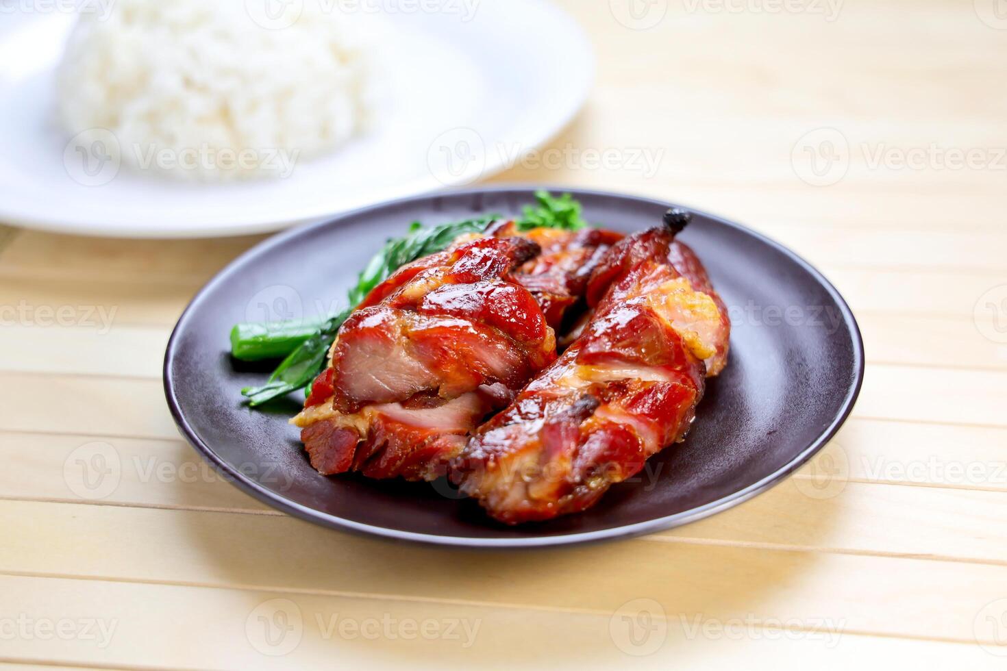 Barbecued Pork with Rice served in plate isolated on table side view of Hong Kong food photo