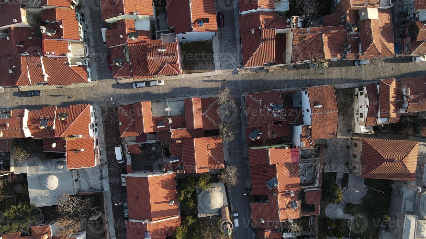 Top aerial drone view house roofs photo