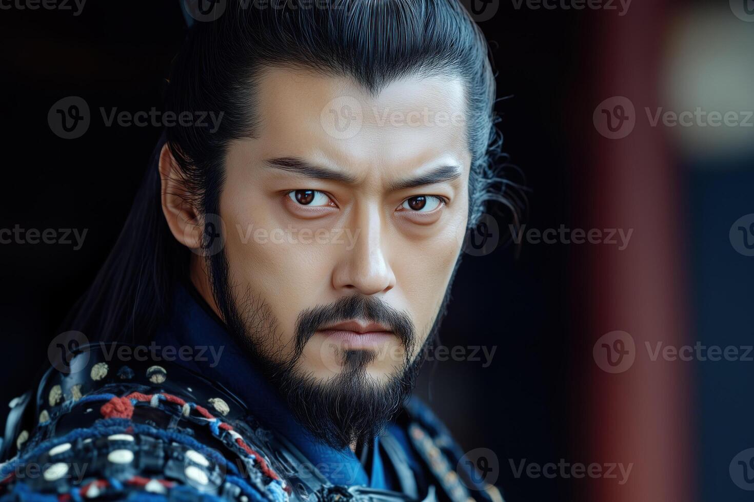 Portrait of a handsome asian man in traditional japanese costume photo