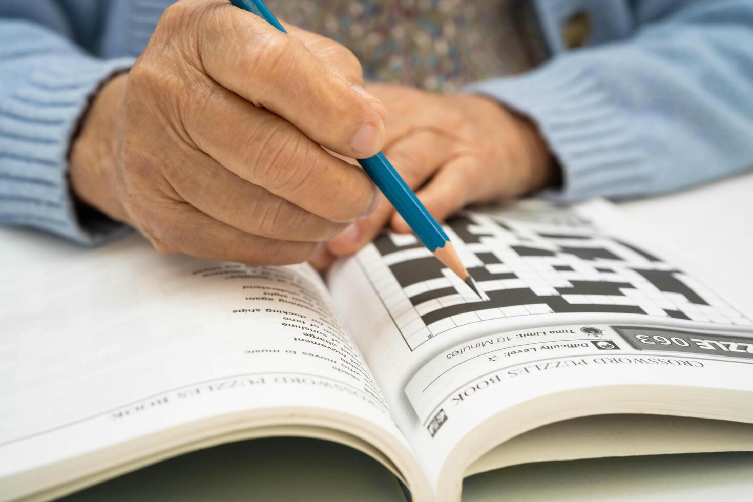 elderly woman playing game. photo