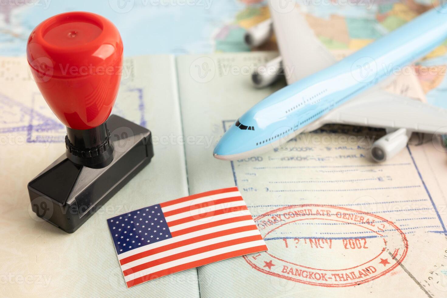 US America flag with passport and airplane for travel. photo