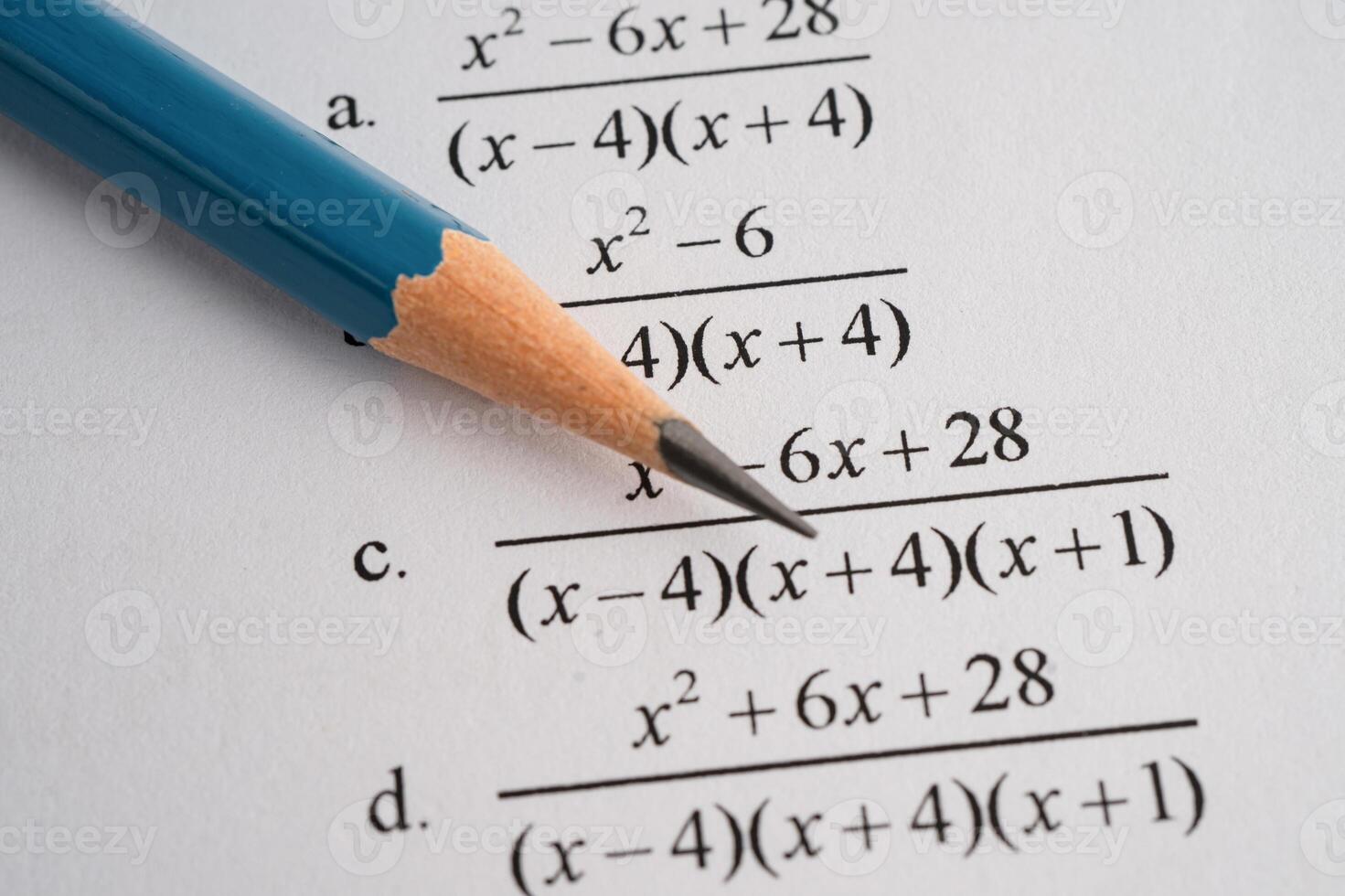 Pencil on mathematic formula exercise test paper in education school. photo