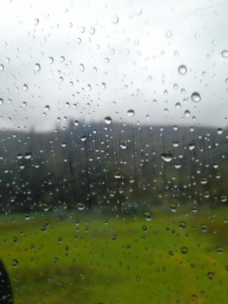 small raindrops on the window of the living photo