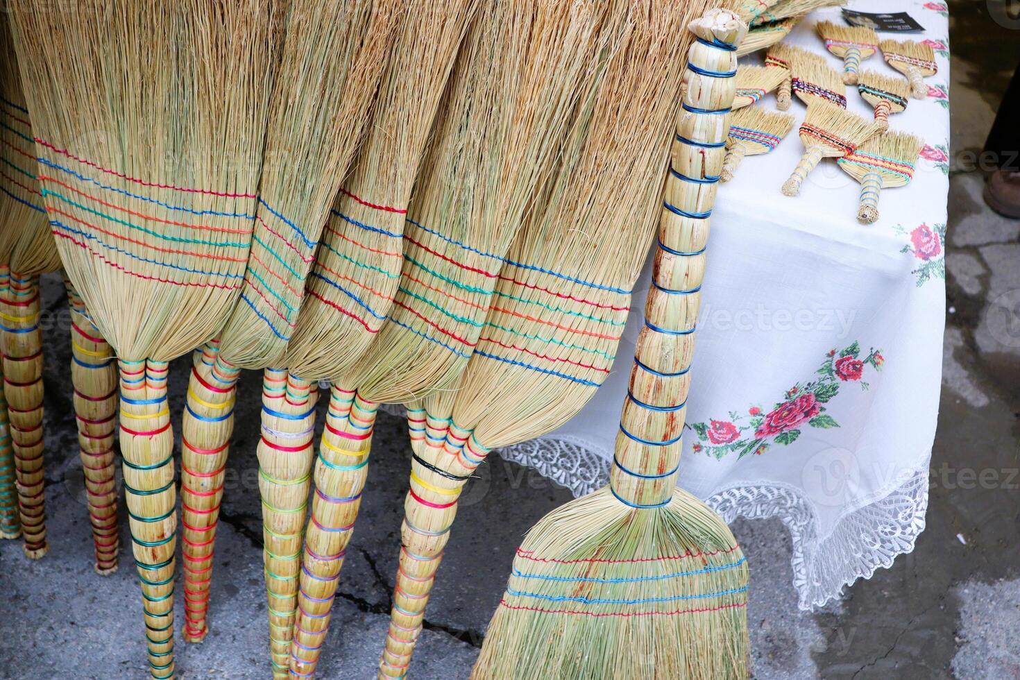 Beautifully Colorful Handmade Brooms Perfectly Crafted for Traditional Cleaning Tasks photo