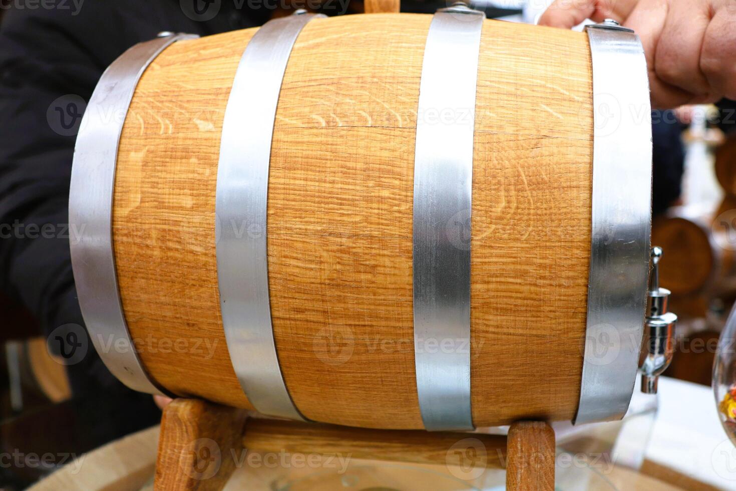 A beautifully handcrafted wooden barrel featuring durable metal bands for added strength photo