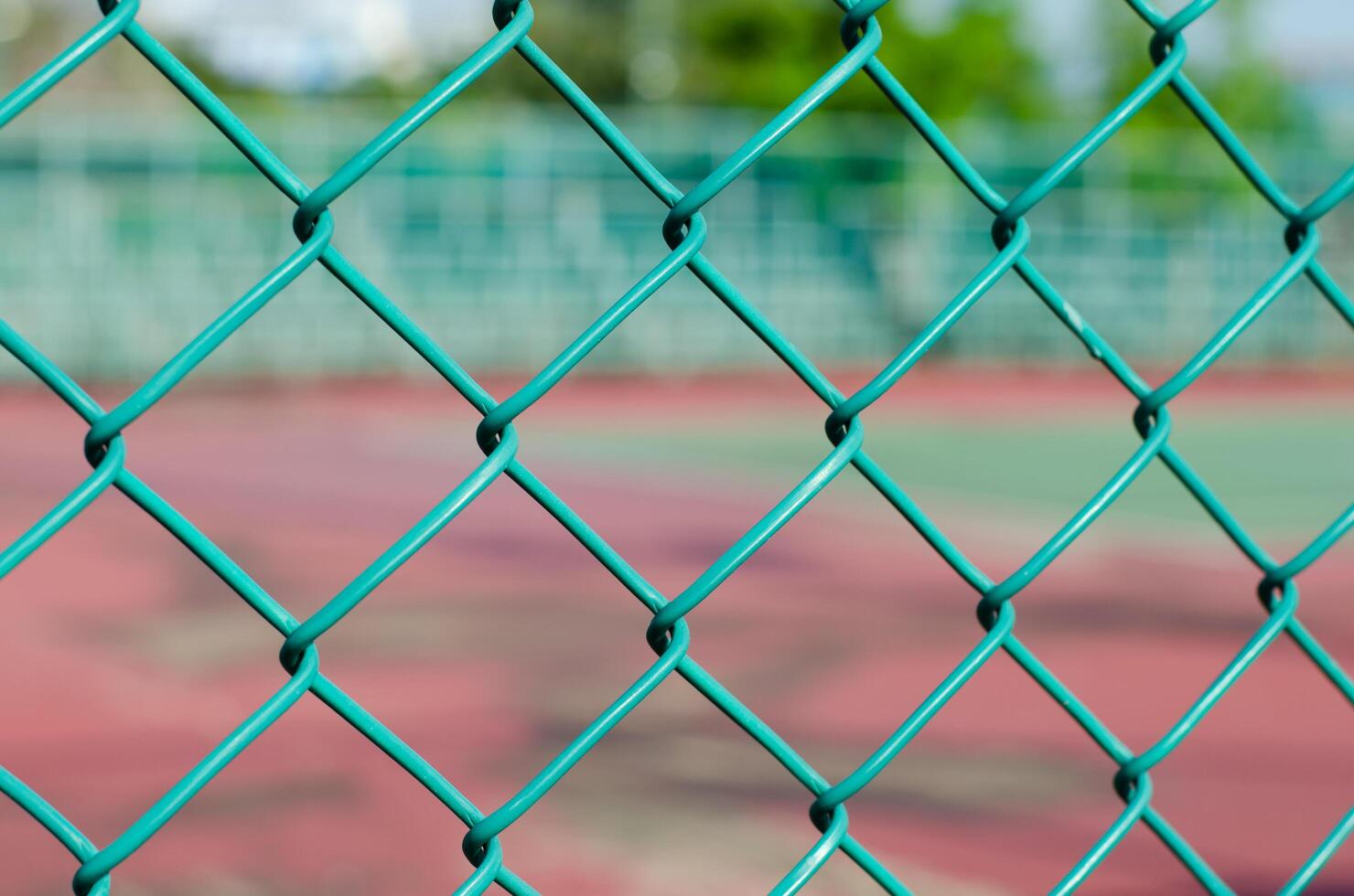 Wire Net Beside Sports Field for Background Used photo