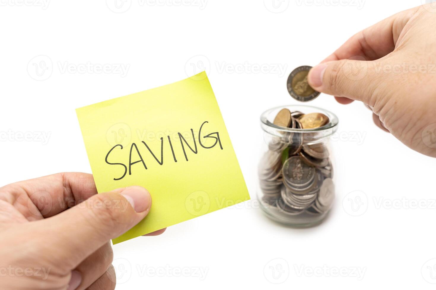 Saving money concept with Saving text on sticky note. Happy to placing a coin into a jar.Commitment to achieving financial goals. isolated on white background. photo