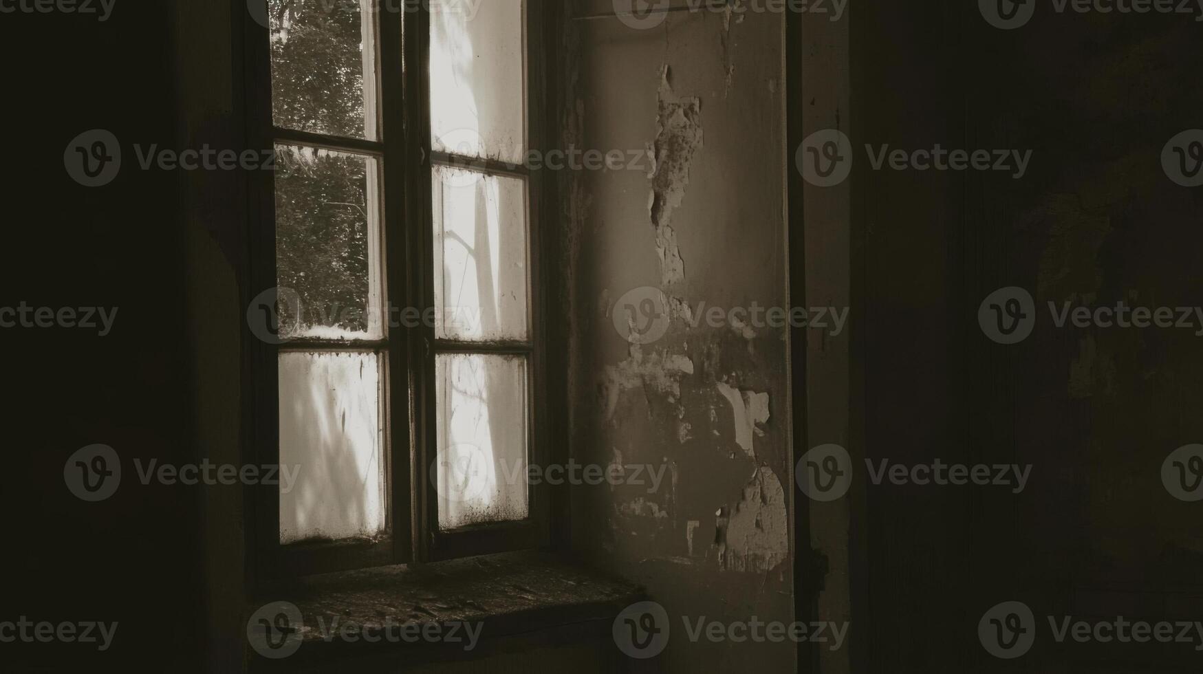 An old window in an abandoned building photo
