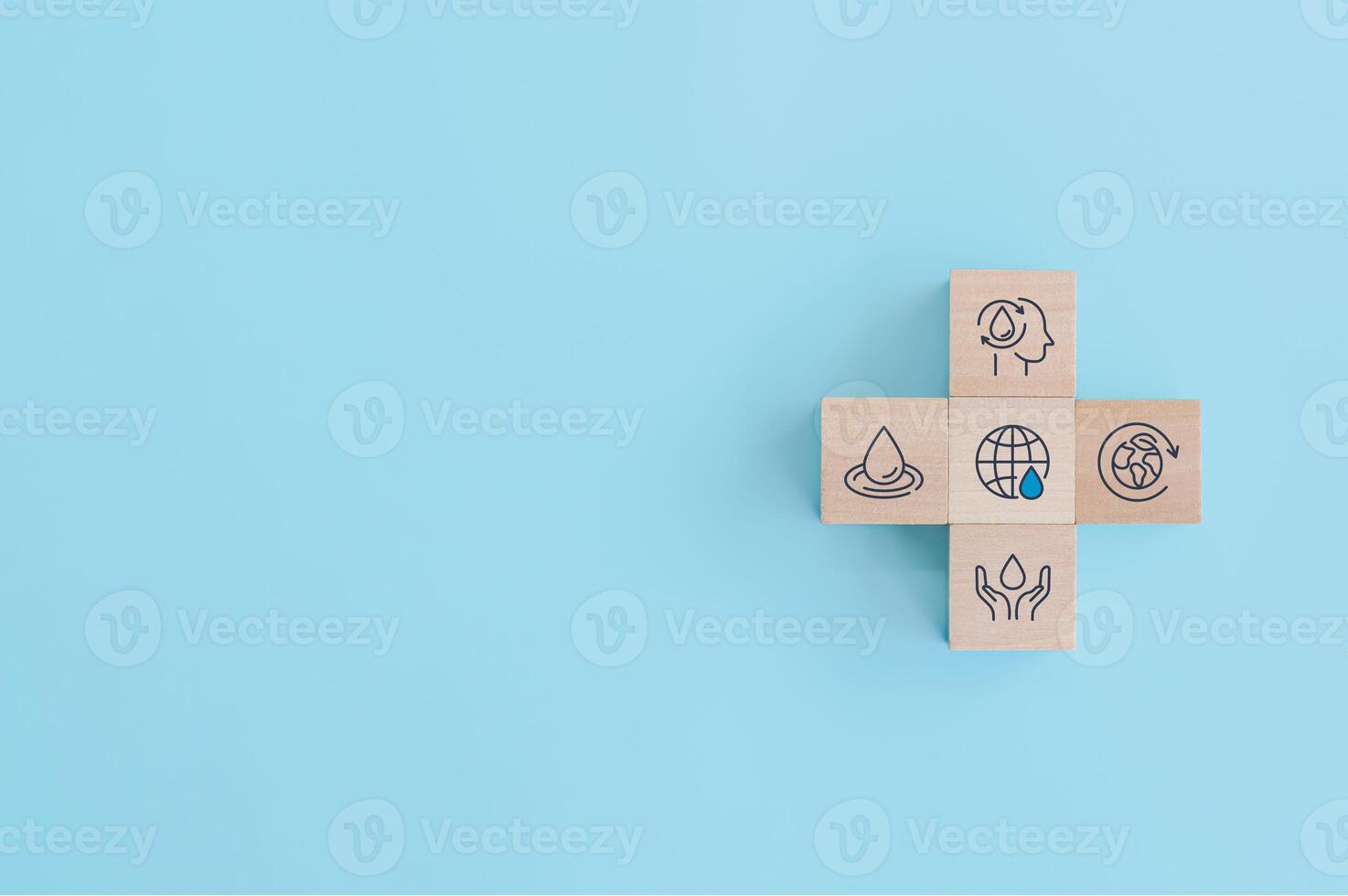 Wooden block with icons for World Water Day. accelerating change and every drop matters. Saving water and world environmental protection concept. clean renewable energy. water for peace. photo