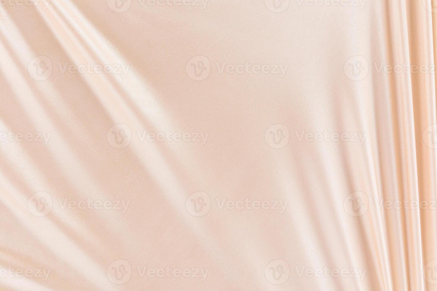 chic textured background of satin fabric in beige, creamy color. soft parallel folds. elegant fabric drapery. layout, design. Wedding Concept. photo