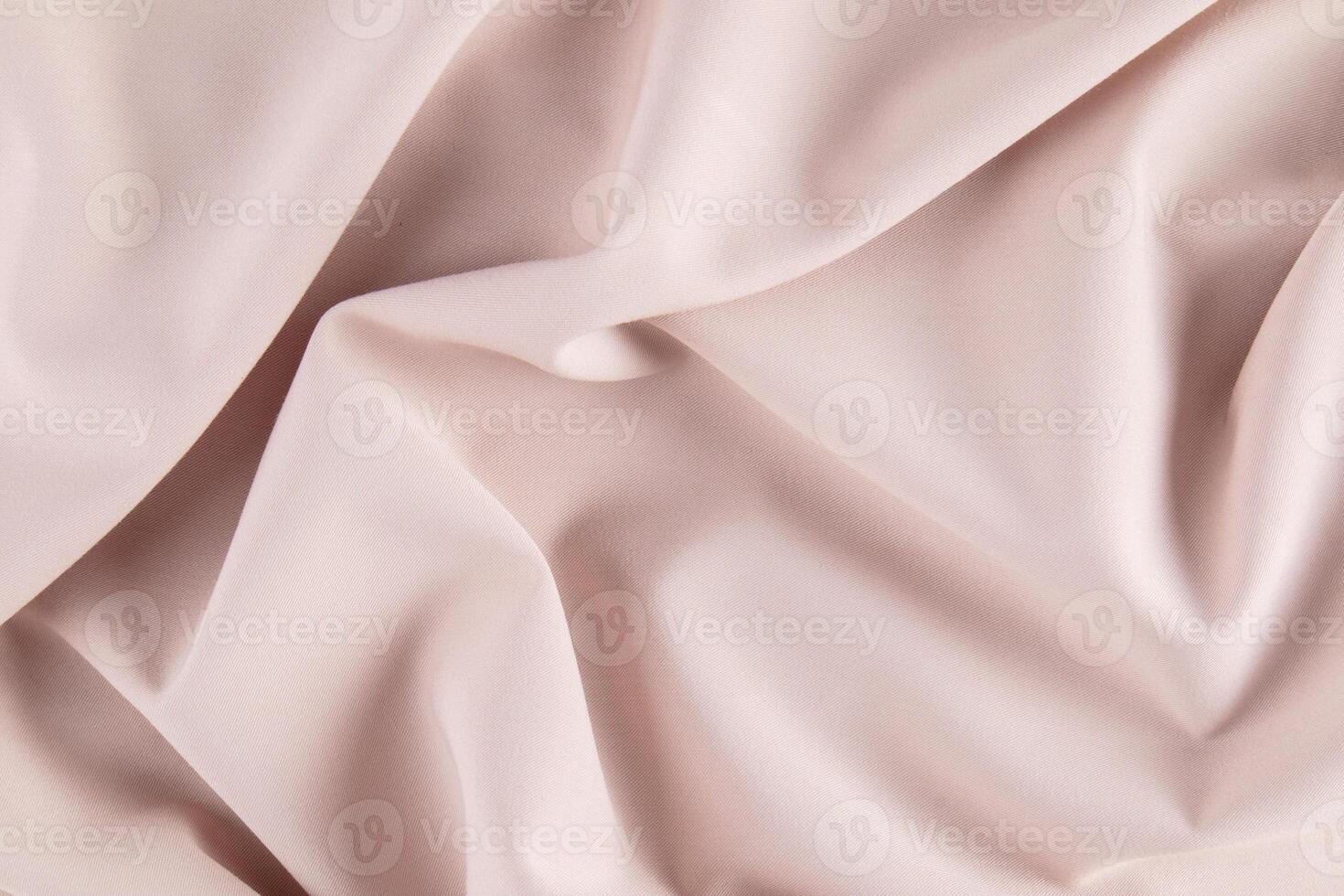 Layout for design. Soft beautiful pleats satin fabric modern coffee shade. Trendy color of the year mocha mousse. copy of the space. photo