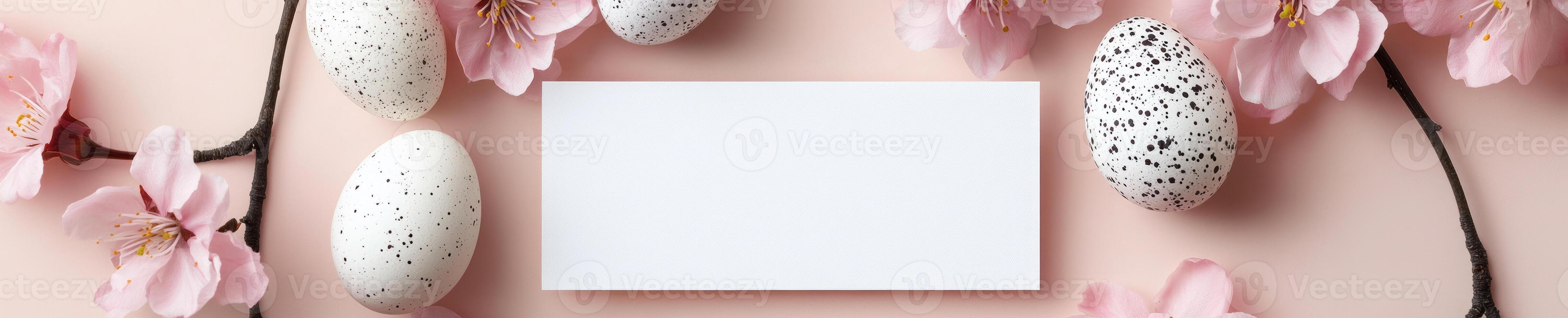 Elegant Easter greeting card mock up with speckled eggs and pink blossoms for festive celebration design photo