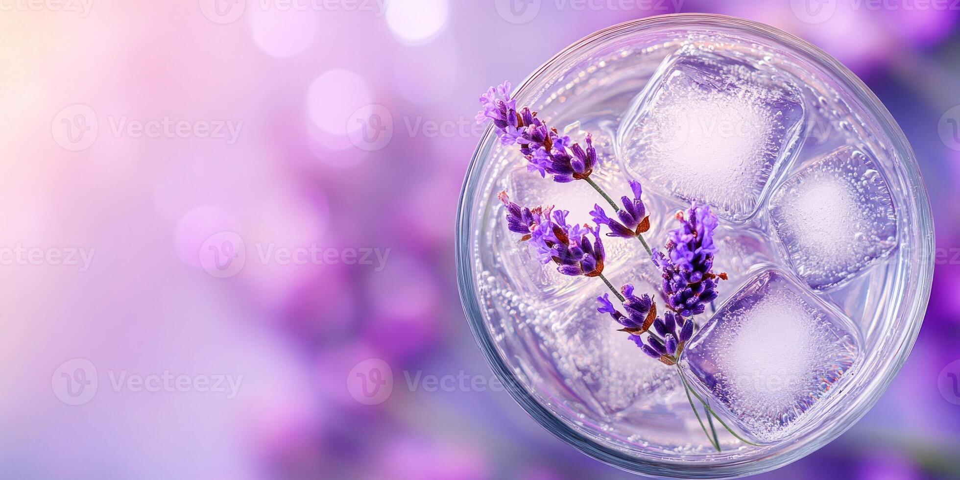 Luxurious lavender lemonade with ice cubes in elegant glass for refreshing summer drink photo