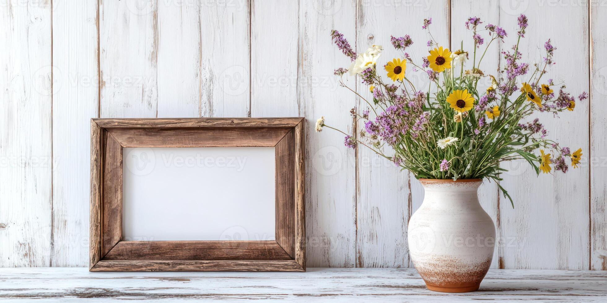 Rustic farmhouse decor with distressed frame and wildflower bouquet photo