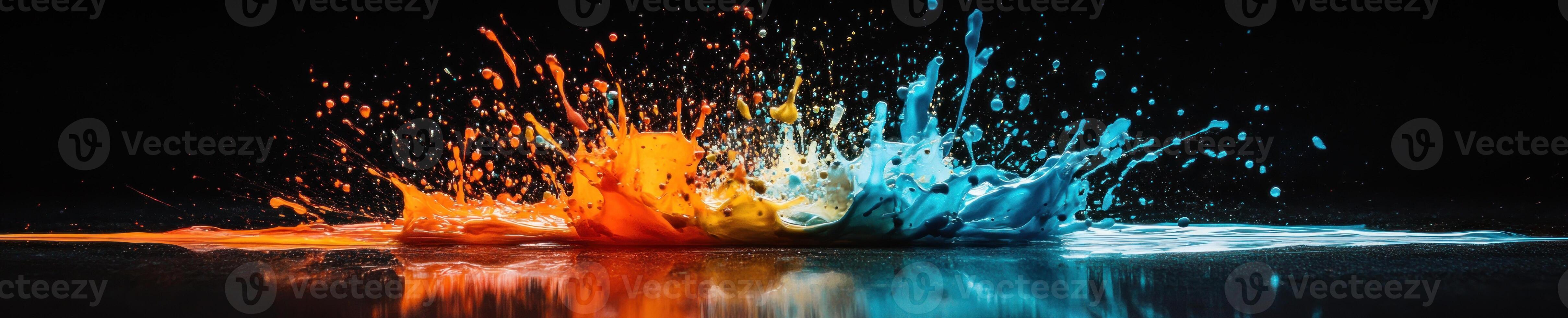 Vibrant explosion of colorful liquid paint splash on black background for creative design photo