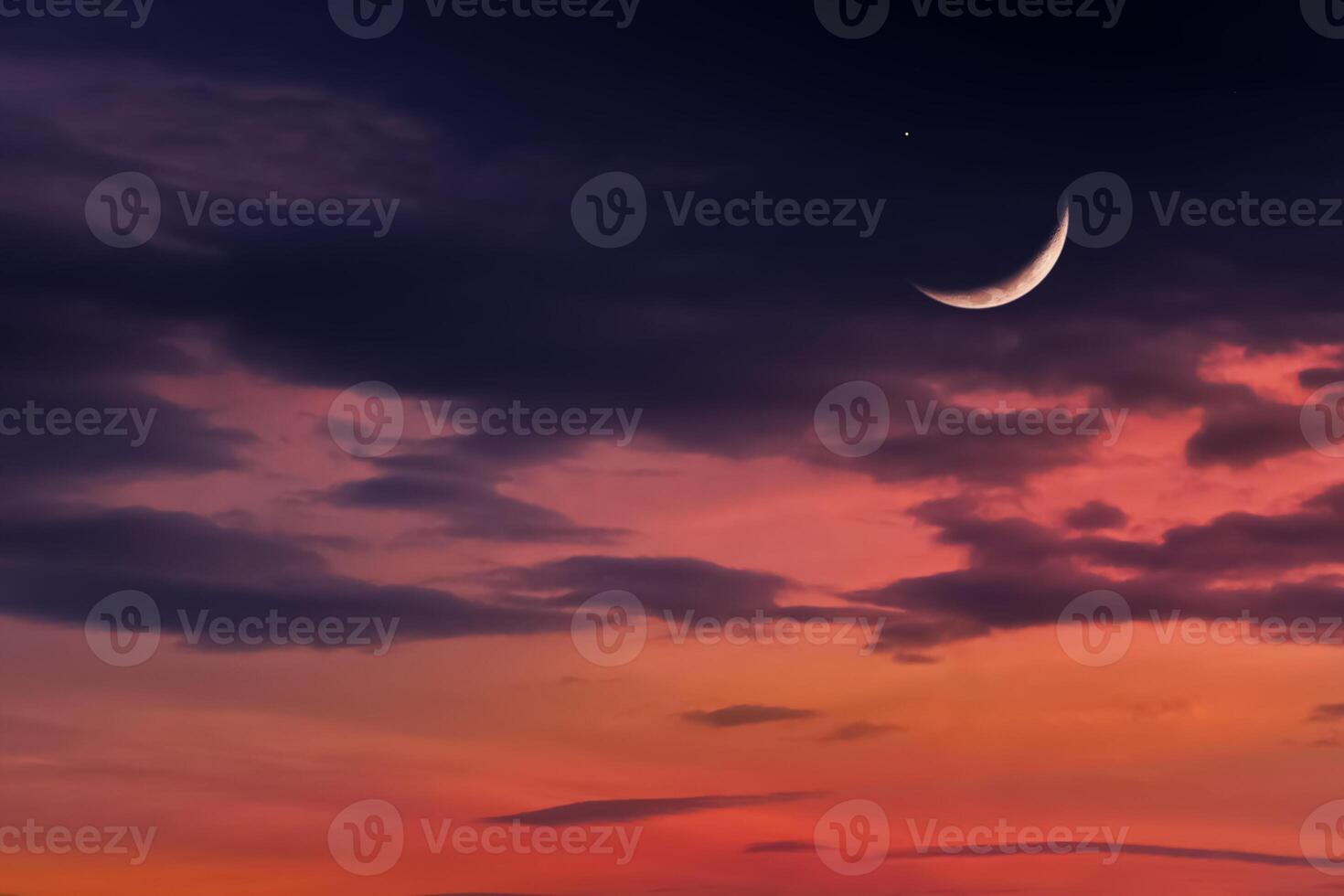 Ramadan Night with Crescent moon on dark blue sky background, Dramatic Sunset with Twilight dusk sky,Islamic religion for Ramadan Kareem,Eid al Adha, Eid Mubarak, Eid al fitr,New Year Muharram photo