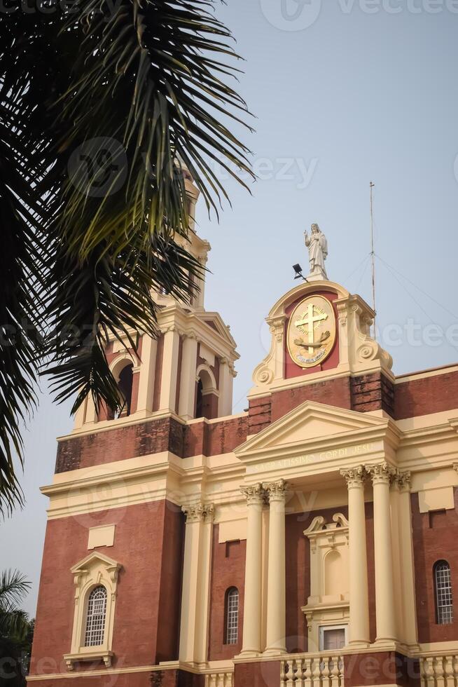 A large building with a clock on the front photo