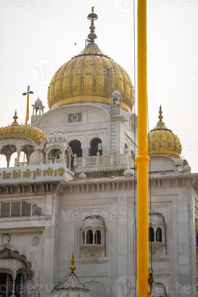 A large white building with gold domes photo