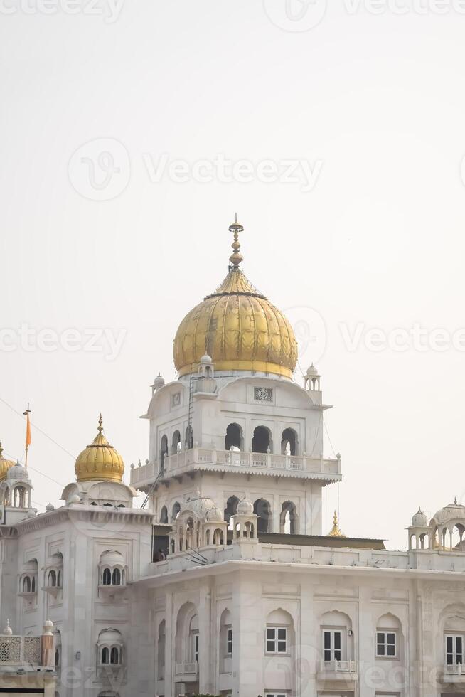 A white building with gold domes photo