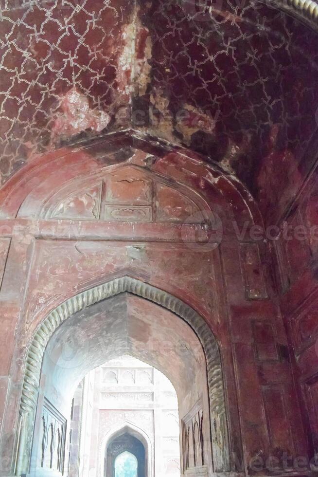 The inside of a red building with intricate designs photo