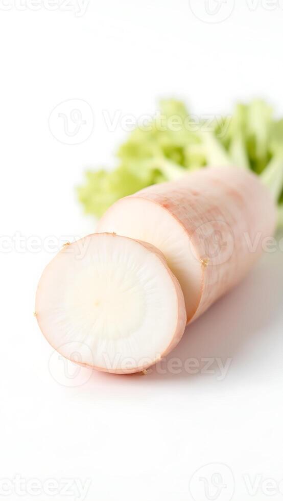 Closeup view of sliced radish with green leaves on a neutral background photo