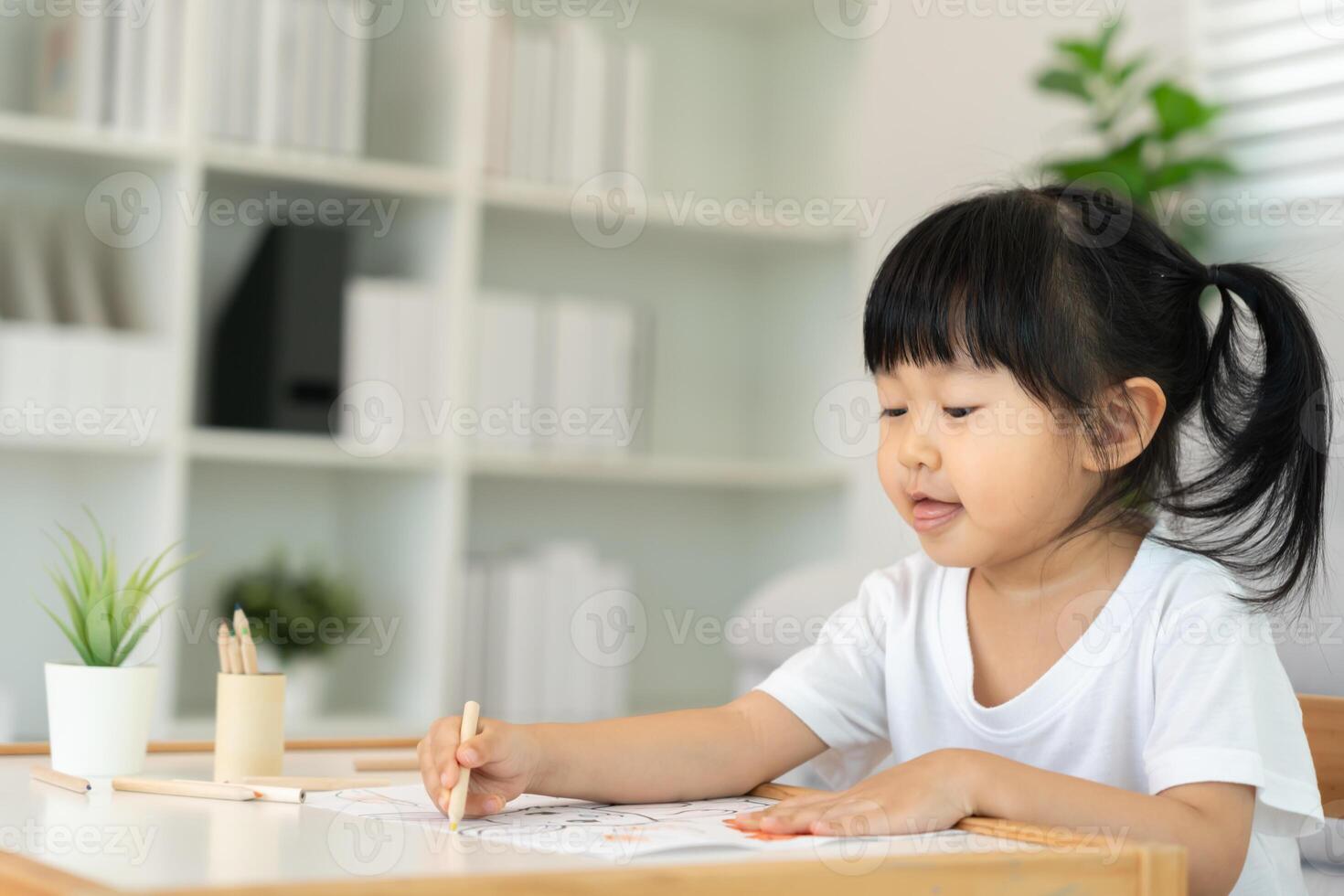 Happy Asia children learning and enjoy paint. family is happy and excited in the house. Mother and daughter having fun spending time together. Holiday, Activity, Executive Function, IQ photo