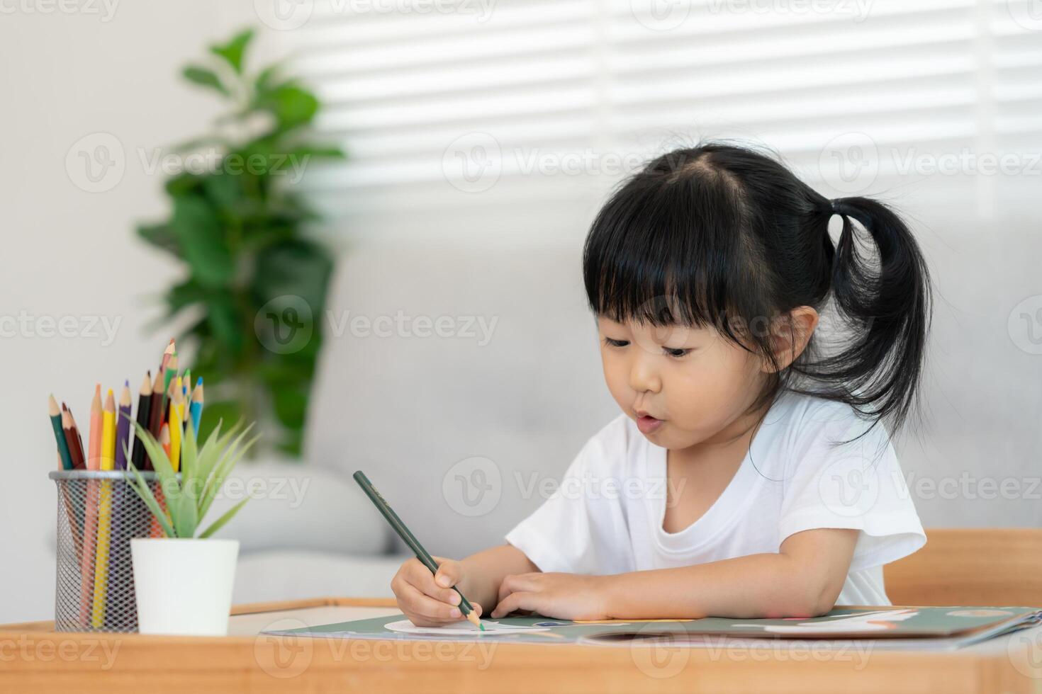 Happy Asia children playing learning paint on paper. Activity, development, IQ, EQ, meditation, brain, muscles, essential skills, family having fun spending time together. photo