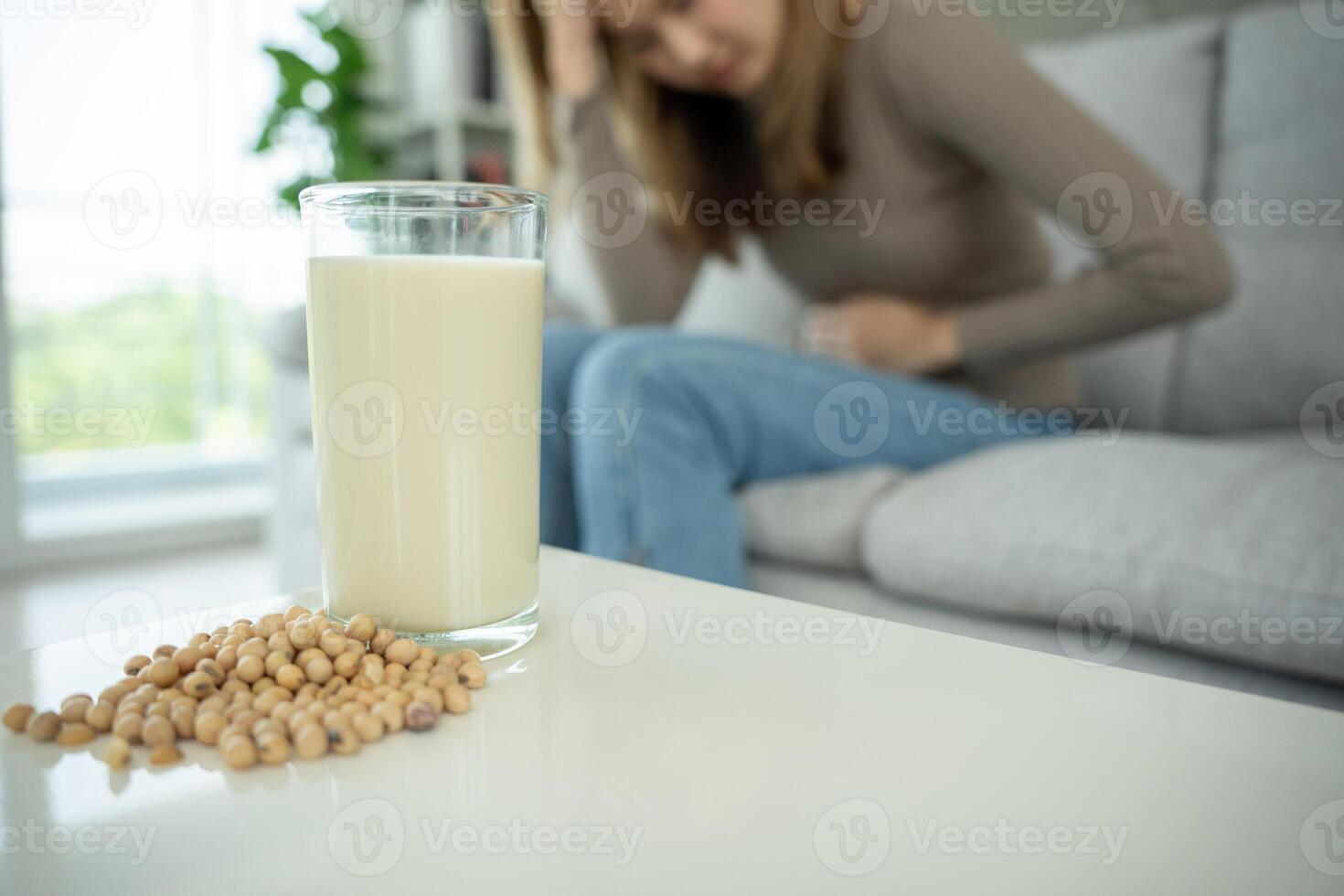 Sick sad unhealthy ill allergic woman, runny stuffy sore nose suffer from intolerance allergy trigger symptoms. abdominal pain, allergens, nut protein, rash, death food allergy. photo