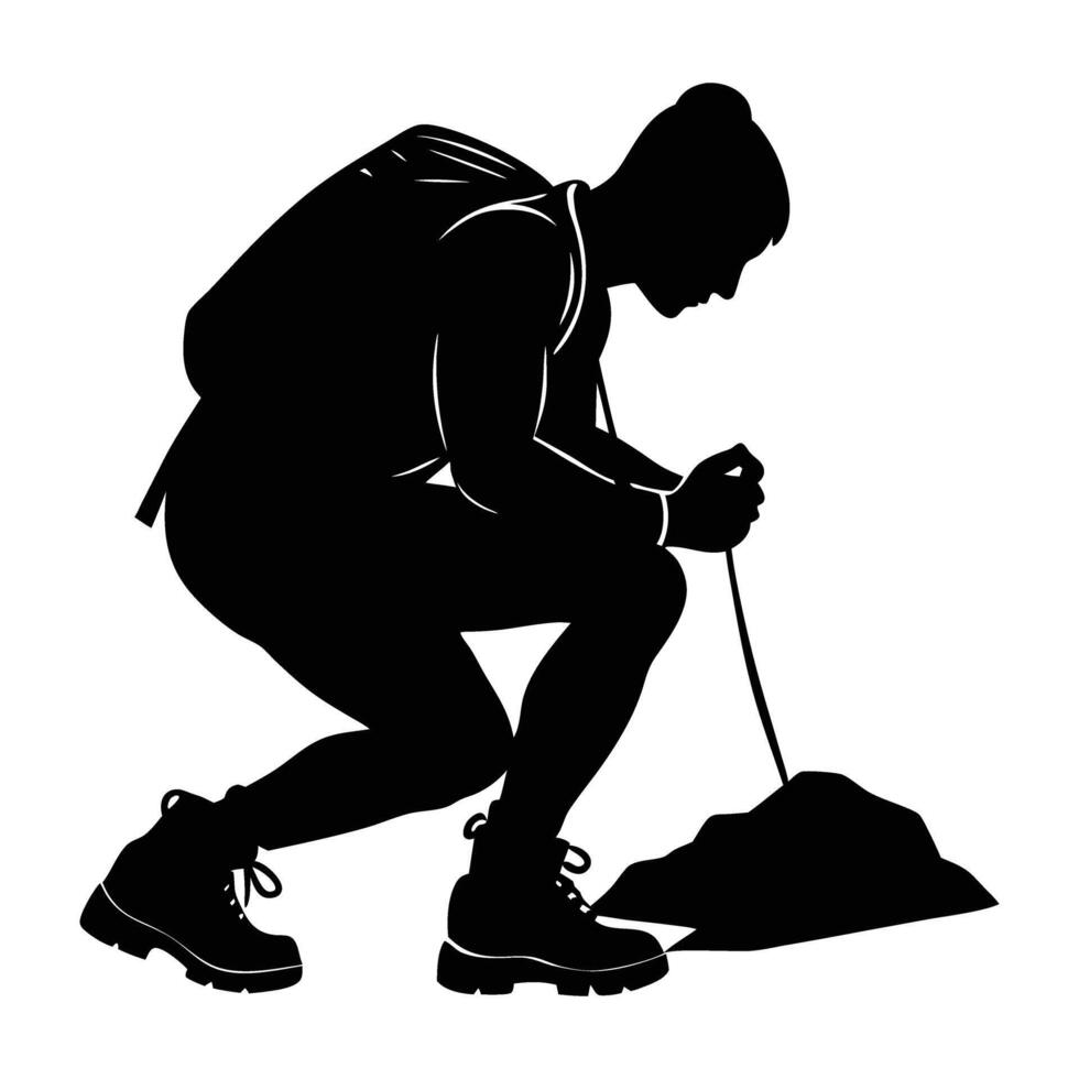 A focused hiker crouching to tie bootlaces on a rocky path silhouette vector
