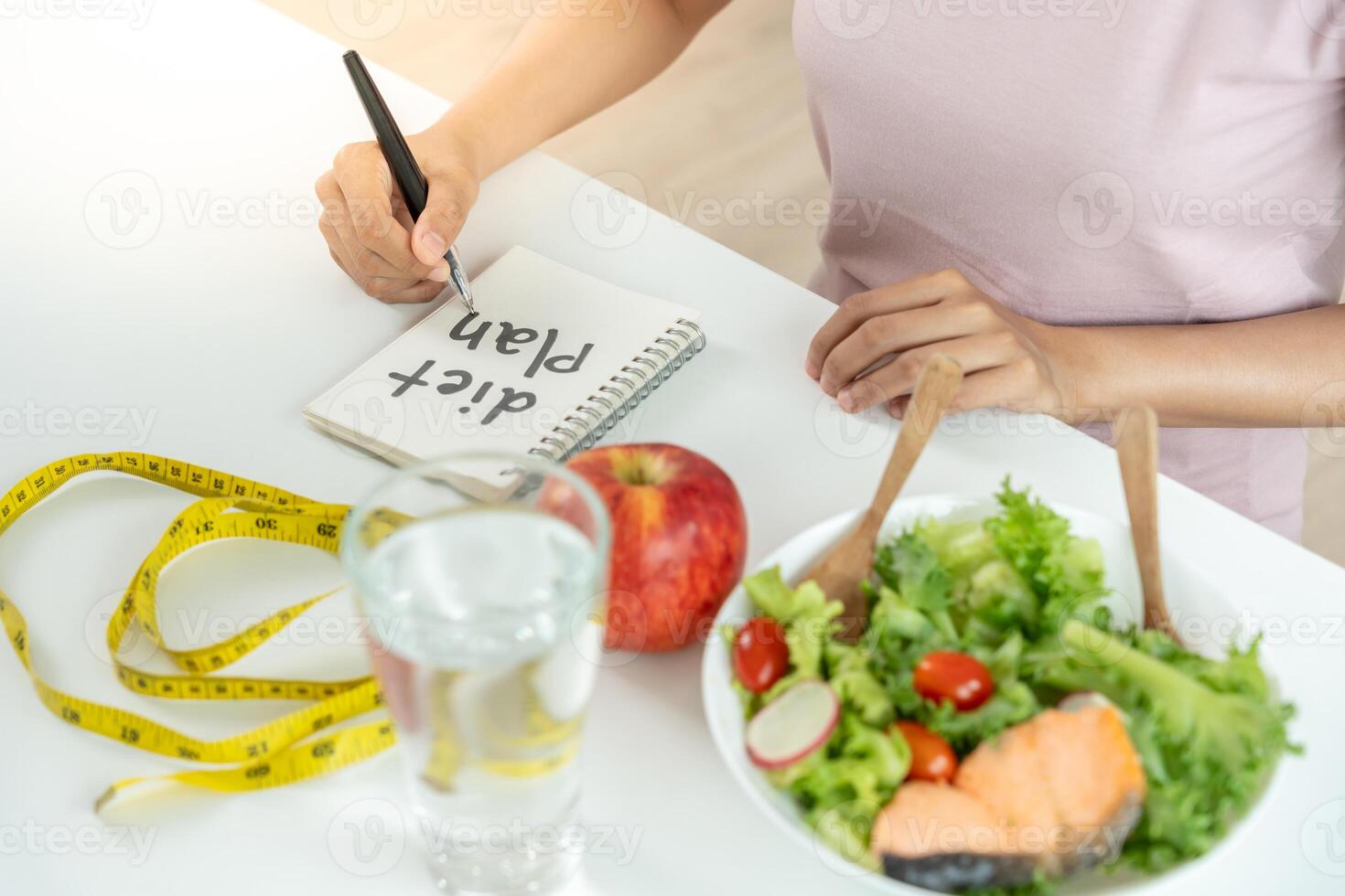 dieting. Beauty slim female body writing diet plan for healthy food. weight loss, lose, balance, control, reduce fat, low calories, routines, exercise photo