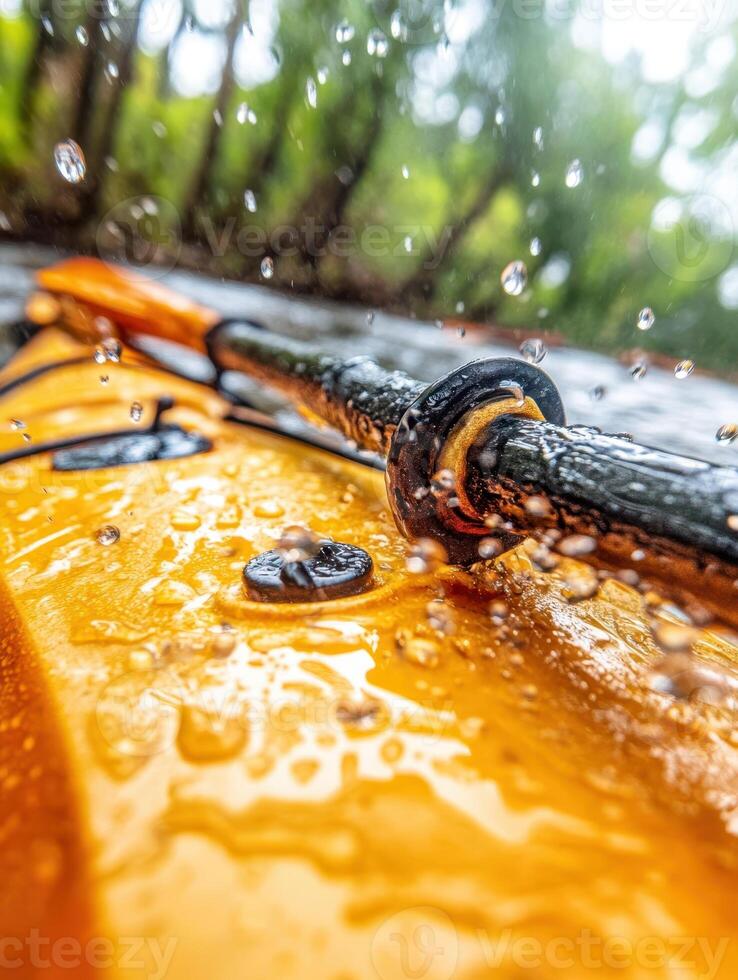 A close up of a kayak with water droplets on it photo