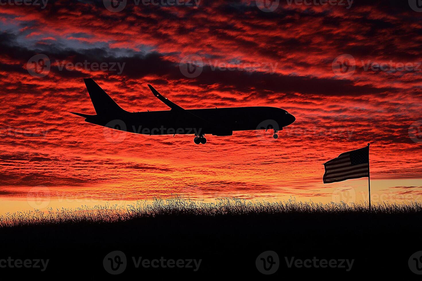 Silhouette of a passenger plane flying low over the earth with the usa flag against a beautiful sunrise or sunset in the sky. Travel concept in the USA. photo