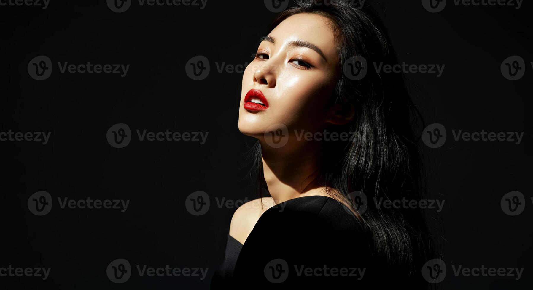 A striking portrait capturing elegance and mystery, highlighting the subject bold red lips photo