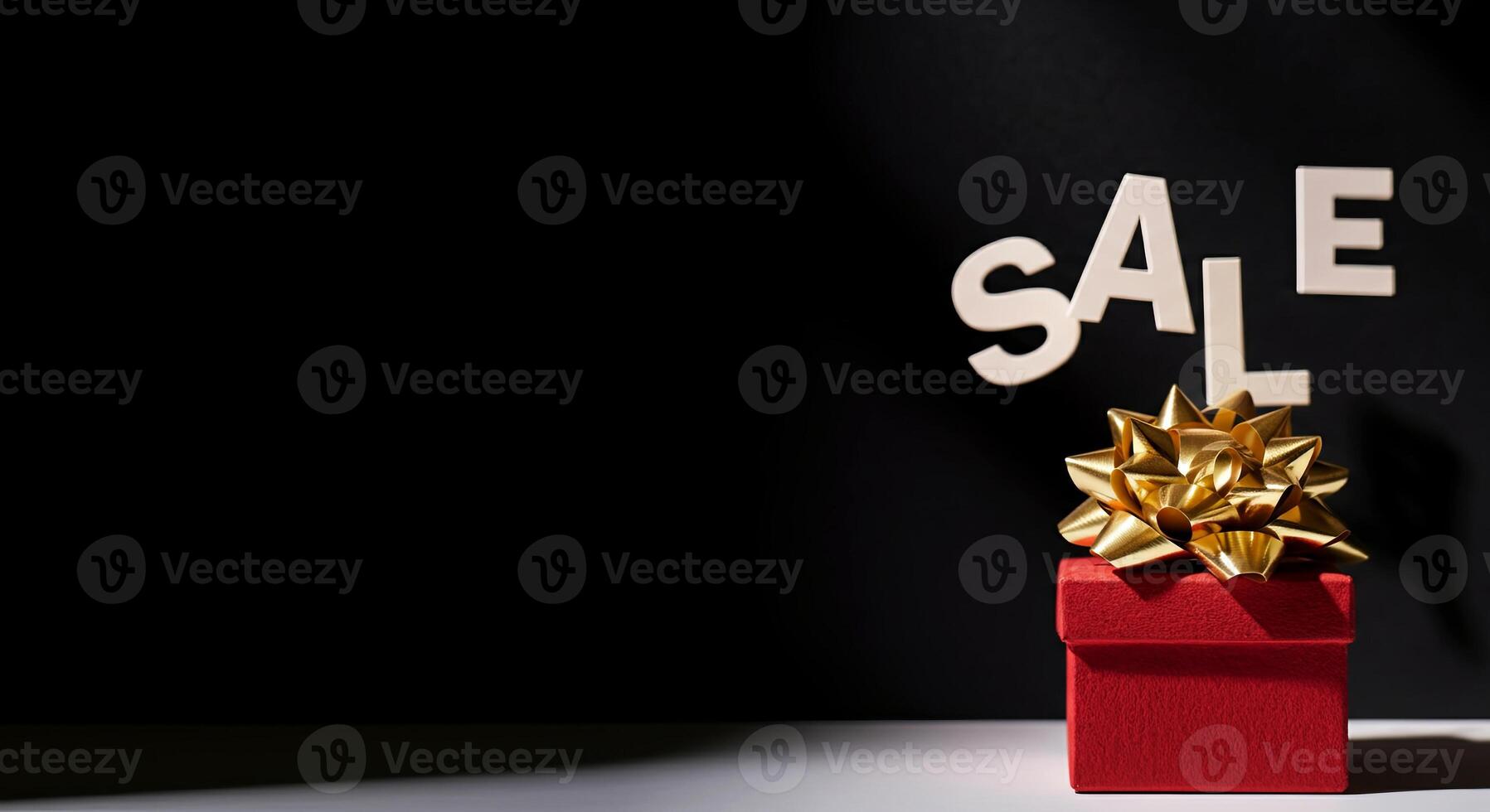 Creative gift box adorned with a golden bow signifies a sale. Captures attention with its vibrant colors photo