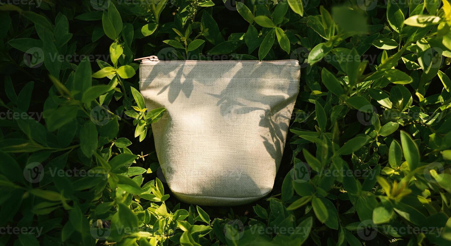 Discover the elegance of simplicity with this minimalist pouch amidst lush greenery photo