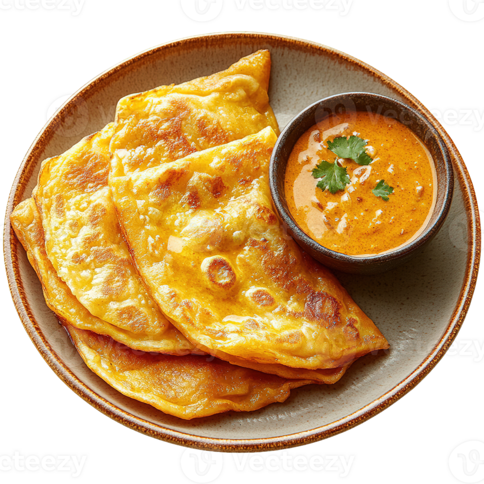Roti Canai with a Side of Spiced Curry Gravy on a Rustic Plate png