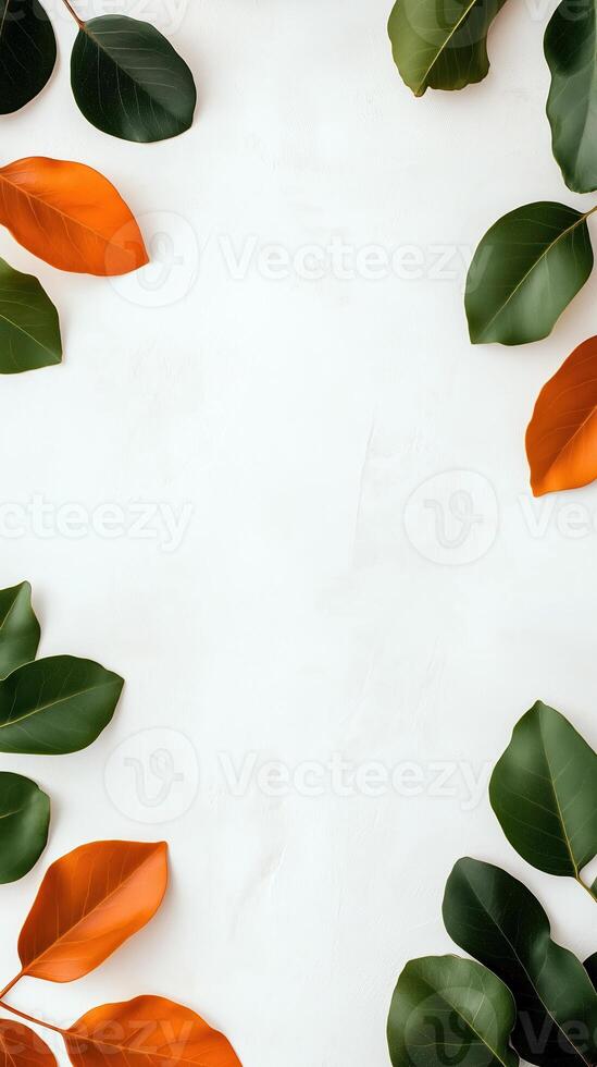 Elegant frame design with green and orange leaves on a white textured background for decoration photo