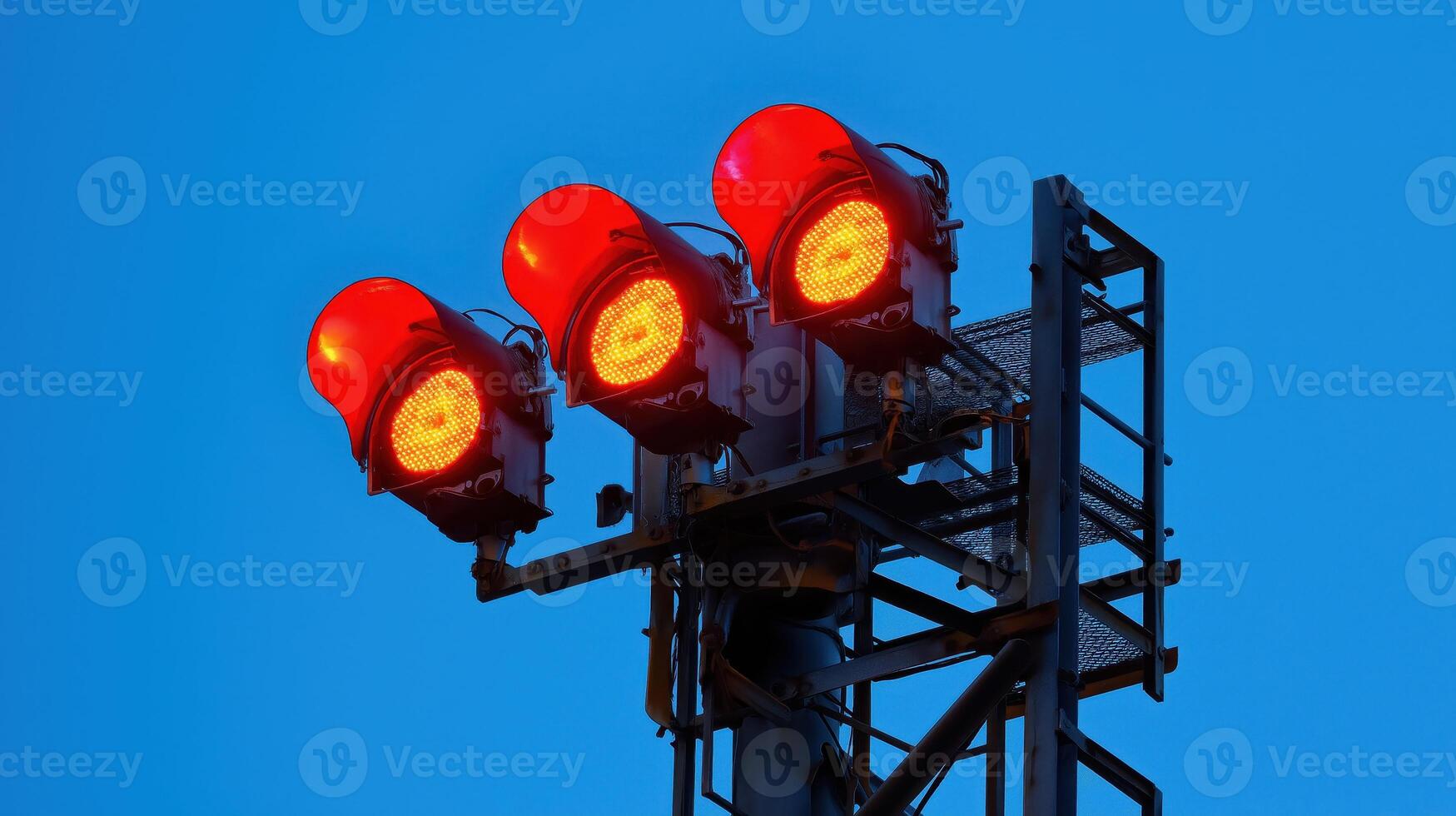 Industrial Red Signal Lights on Tower Against Evening Sky, Emphasizing Safety and Structural Design photo
